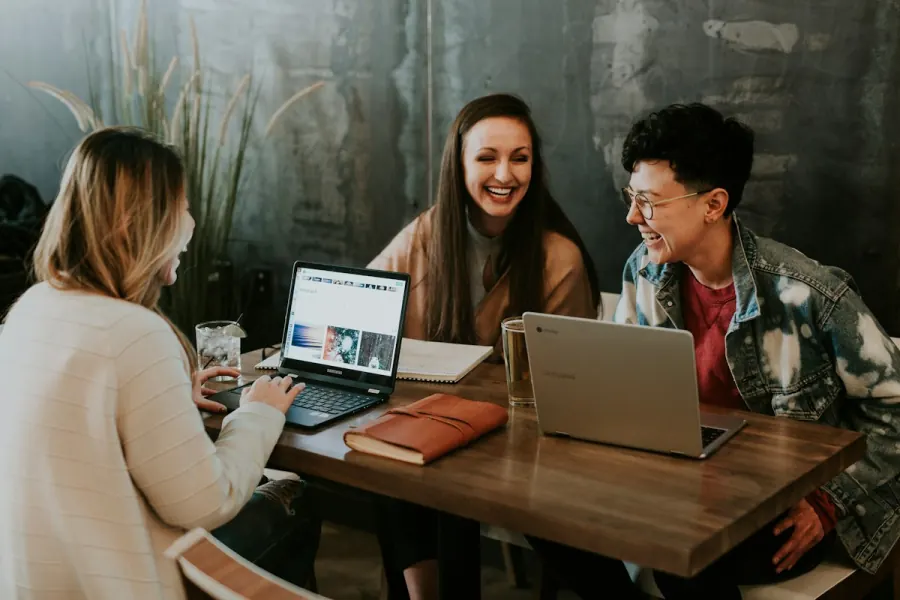 Startup team reviewing ideas around a table