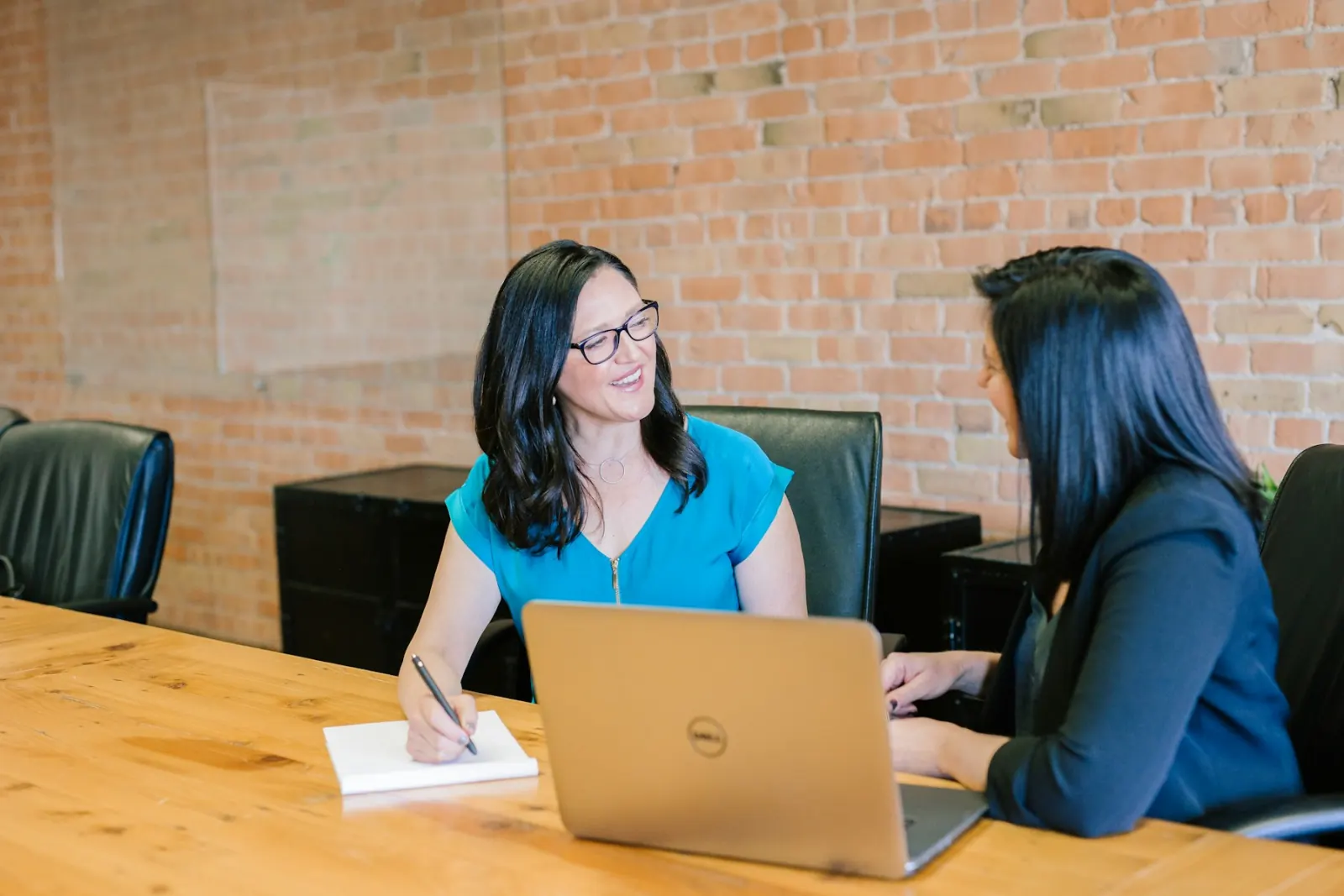 Two business advisors discussing a startup plan